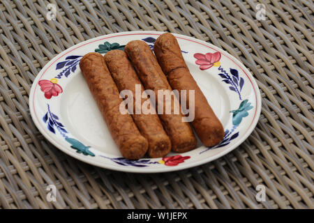 close up of frikandel, a traditional Dutch snack, a sort of minced meat hot dog Stock Photo