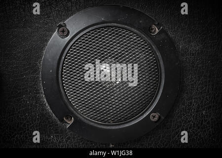 Old speaker Black background Stock Photo