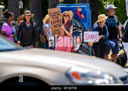 Los Angeles, United States. 02nd July, 2019. Protesters hold up placards as they participate in a Close The Camps protest against migrant detention centers. Organizers called on the Trump administration to close the migrant detention centers and to stop the family separation policies. Similar Close the Camps protests took place across the nation. Credit: SOPA Images Limited/Alamy Live News Stock Photo