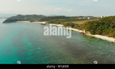 aerial drone: Sandy beach and turquoise water in the tropical resort of Boracay, Philippines, Ilig Iligan Beach. Summer and travel vacation concept. Stock Photo