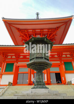 The vibrant red Konpon Daito Pagoda in the Unesco listed Danjo Garan shingon buddhism temple complex in Koyasan, Wakayama, Japan. A famous pilgrimage. Stock Photo