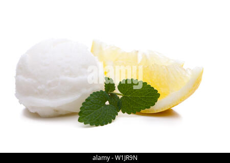 A scoop of lemon ice cream isolated on white background Stock Photo