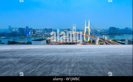 Empty road and Nanpu bridge at night in Shanghai,China Stock Photo