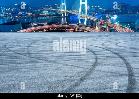 Empty road and Nanpu bridge at night in Shanghai,China Stock Photo