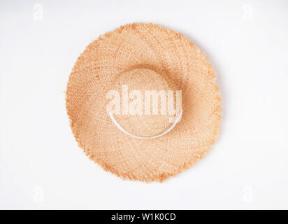 Feminine straw hat with big fields isolated on thite background, top view Stock Photo