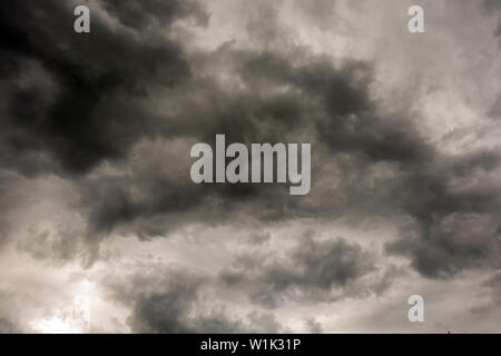 Dark and Dramatic Storm Clouds Area Background Stock Photo