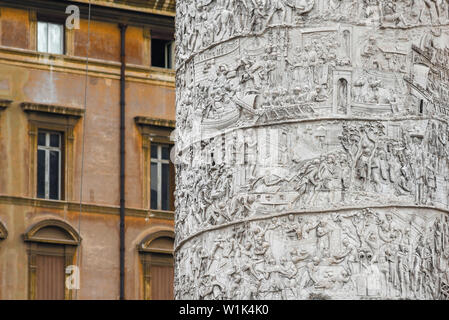 Rome city centre, contrasting view of detail of Trajan's column and a Renaissance era building sited in the center of Rome, Italy Stock Photo