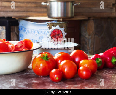 Old Vintage Manual Grinder And Slices Of Fresh Tomatoes Red Bell Pepper And Garlic On The Table For Making Homemade Sauce Ketchup Stock Photo Alamy