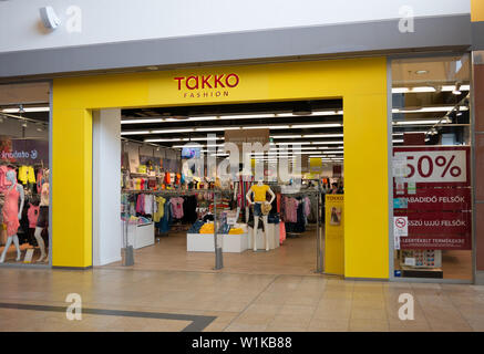 Gyor Hungary 05 07 2019 a takko fashion shop in the arkad of Gyor Stock Photo