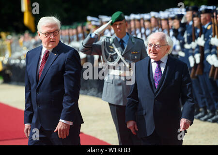 Berlin, Germany. 03rd July, 2019. Frank-Walter Steinmeier (SPD, l), Federal President, and Michael D. Higgins, President of Ireland, will visit the Bellevue Castle during the military honours. Credit: Gregor Fischer/dpa/Alamy Live News Stock Photo