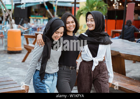 Young people standing enjoy hanging out together Stock Photo