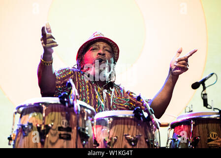 Leon Mobley, percussionist of the Innocent Criminals, performing live on stage together with Ben Harper at the Gruvillage Festival in Grugliasco, near Stock Photo