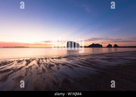 Sunset on the beach of Pak Meng, Thailand Stock Photo