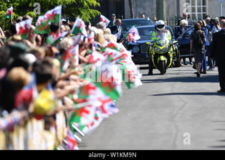 The Duchess of Cornwall and the Prince of Wales arrive at Victoria Park in Swansea, Wales, to mark 50 years since his investiture as Prince of Wales. Stock Photo