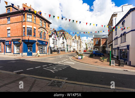 Town Centre Summer View From Great Torrington Pannier Market: The Square with Clock Tower, Bright Flowers, Town Hall and Buildings; Great Torrington, Stock Photo