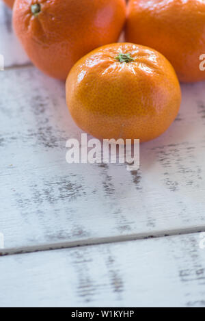 Tangerines on a white wooden background Stock Photo