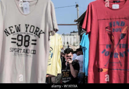 Gaza City, Gaza Strip, Palestinian Territory. 30th May, 2019. A picture taken on May 30, 2019, shows Palestinian vendors display second hand goods at a public market in Gaza city. Due to the current economic situation in Gaza Strip, many of the Palestinians resort to meet their needs of used goods Credit: Bashar Taleb/APA Images/ZUMA Wire/Alamy Live News Stock Photo