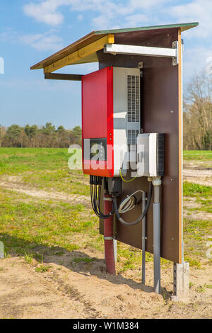 European solar collector inverter outdoors in landscape Stock Photo