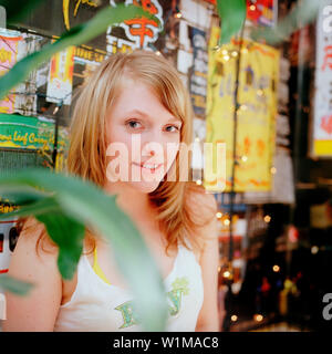 Young woman looking at camera, portrait Stock Photo