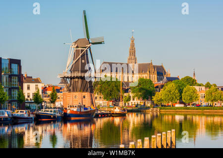 Skyline of Haarlem, North Holland, Netherlands, with Windmill 'De Adriaan' from 1779 and 13th Century Saint Bavo Church Stock Photo