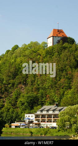 Castle in the mountain forest, at the top of the hill. Stock Photo