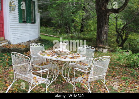 Signs of the Fall Season Falling Leaves Hot Cider Pumpkin Pie Stock Photo