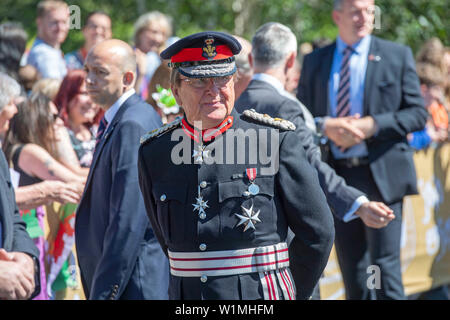 Swansea, Wales, UK. 03rd July, 2019. The Lord Lieutenant of West Glamorgan Byron Lewis during Prince Charles,  Prince of Wales and Camilla, Dutchess of Cornwall visit Victoria Park in Swansea today to help celebrate the 50th anniversary of Swanseas achieving City status. Credit: Phil Rees/Alamy Live News Stock Photo