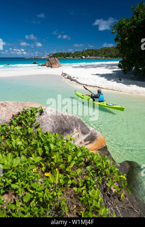 Sea kayak tour with catamaran as basecamp on the Seychelles, Indian Ocean Stock Photo