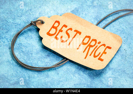 best price sign, marketing concept - handwriting on a paper price tag Stock Photo