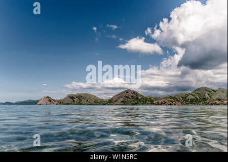 View from the boat towards coast and hills, Komodo, Lesser sunda islands, east nusa tenggara, indonesia Stock Photo