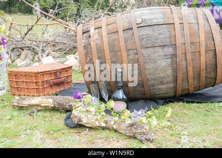 Chic picnic for the celebration of the harvest festival, vinification of champagne, barrel and bottle of champagne Stock Photo