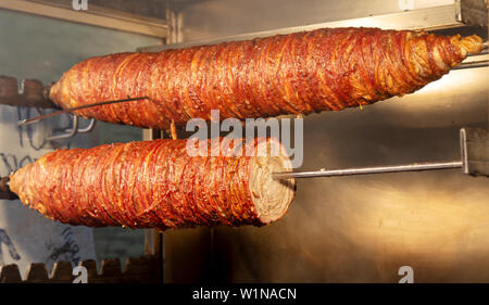 Turkish Street Food Kokorec made with sheep bowel cooked in wood fired oven Stock Photo