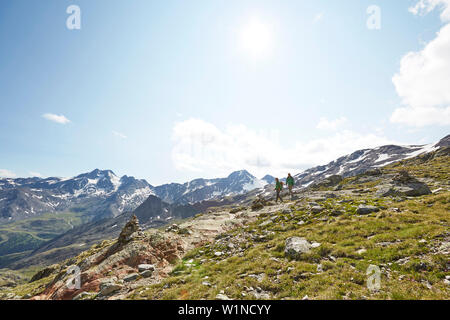 Couple hiking in the mountains Stock Photo