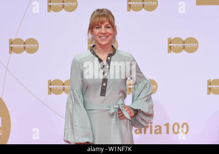 02 July 2019, Bavaria, Munich: The actress Bernadette Heerwagen stands at the reception of the Bavaria Film on the Red Carpet at the Filmfest Munich which takes place from 27.06.2019 to 06.07.2019. Photo: Felix Hörhager/dpa Stock Photo