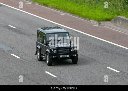 2010 Land Rover Defender 90 Hard TOP TD; UK; Vehicular traffic, transport, modern, saloon cars, north-bound on the 3 lane highway. Stock Photo