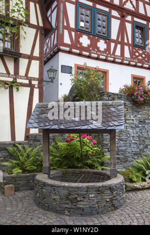 Well in the old town of Bacharach by the Rhine, Upper Middle Rhine Valley, Rheinland-Palatinate, Germany, Europe Stock Photo