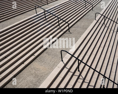 Wide, prefabricated steps and handrails. Stock Photo