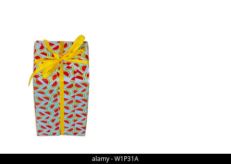 Isolated Gift box wrapped with paper stripe watermelon for the festivities on a white background with clipping path. Stock Photo