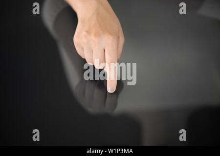 hand using black interactive panel Stock Photo