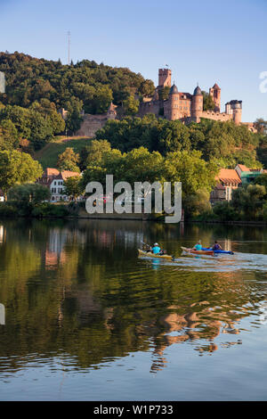 People kayaking on Main river with Burg Wertheim castle, Kreuzwertheim, near Wertheim, Spessart-Mainland, Franconia, Baden-Wuerttemberg, Germany Stock Photo