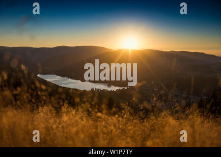 View from Hochfirst to Lake Titisee and Feldberg mountain at sunset, Neustadt, Black Forest, Baden-Württemberg, Germany Stock Photo