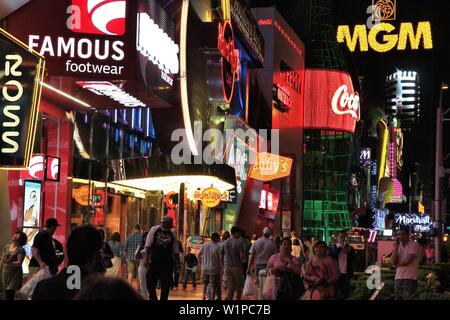 LAS VEGAS, USA - APRIL 14, 2014: People visit the famous Strip in Las Vegas. 15 of 25 largest hotels in the world are located at the strip with more t Stock Photo