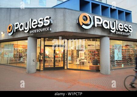 SAN FRANCISCO, USA - APRIL 8, 2014: Shoppers visit Payless Shoesource footwear store in San Francisco, USA. Payless went bankrupt in 2017. Stock Photo