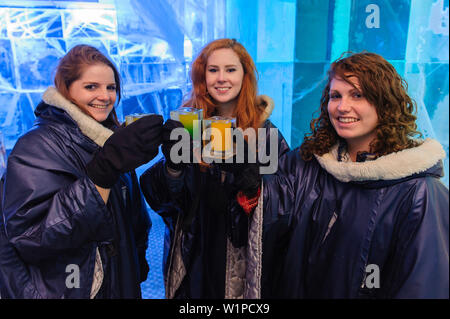 Young women from America in the Absolute Ice Bar, Stockholm, Sweden Stock Photo