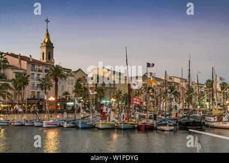 Mediterranean Fishing boats at Sanary-Sur-Mer , twilight, Promenade, Mistral Clouds, French Riviera, Cote d Azur, France Stock Photo