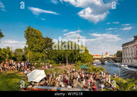 People dancing near the Spree River and Bode Museum, Berlin, Germany Stock Photo