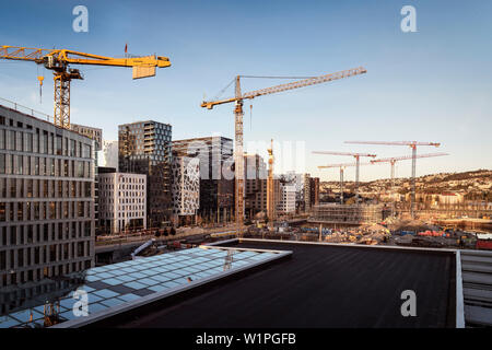 view from rooftop of Opera House at the area named BARCODE, construction site and plenty of tower cranes, Oslo, Norway, Scandinavia, Europe Stock Photo