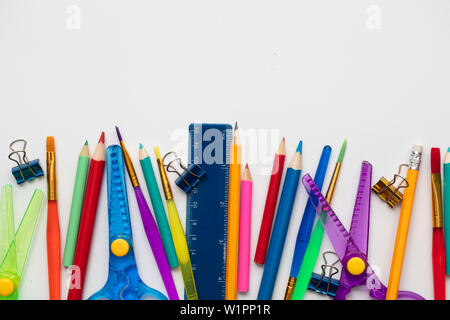 A large set of school art supplies on a plain white background Stock Photo