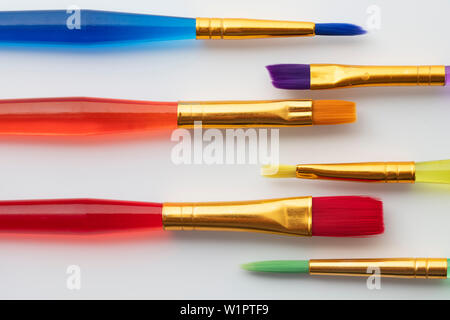 Colourful creative paintbrush art supply background Stock Photo