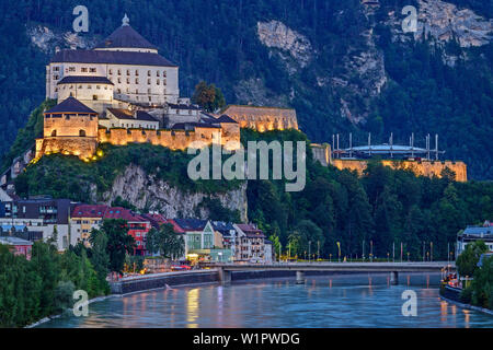 River Inn with city and illuminated castle of Kufstein, Kufstein, Tyrol, Austria Stock Photo